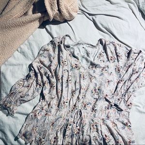 Pink long sleeve floral blouse with tapered waist